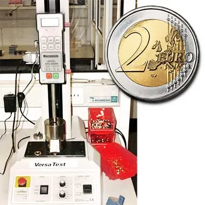 Test di estrazione dei componenti del centro della moneta Euro bi-metallica