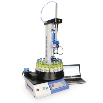 ABC-t automated bottle closure testing system product shot with yellow bottles