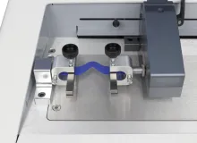 FPT-H1 Graves tear test ASTM D1004 using 100 mm vice grips, face view
