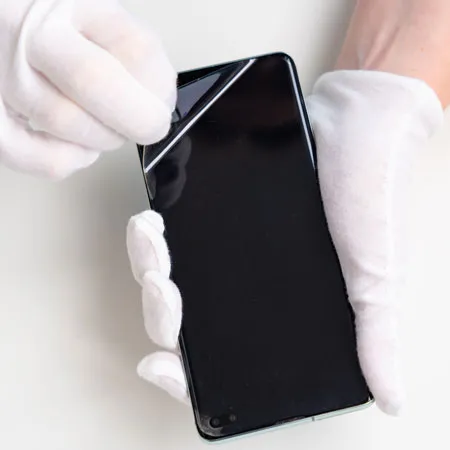 Mobile phone screen protector application and release liner peel by hand