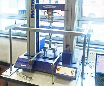 Sistema de teste de extração de fixador industrial