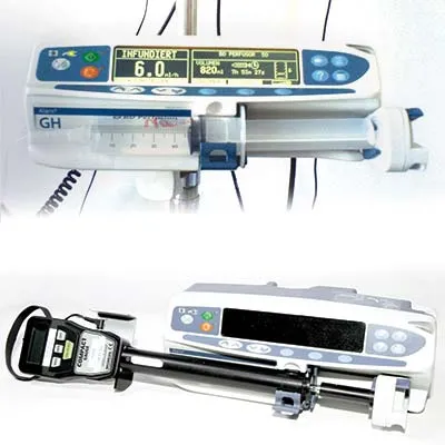 Syringe pump calibrator and syringe pump in use