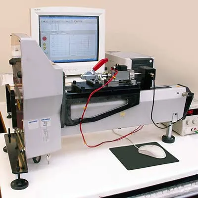 Horizontally oriented test stand to measure the stroke force of solenoids