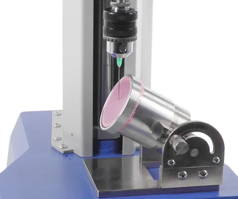 Needle sharpness test with custom-designed adjustable angle fixture and skin simulation membrane