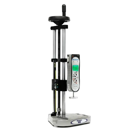 Photo of a manual test stand with mounted digital force gauge